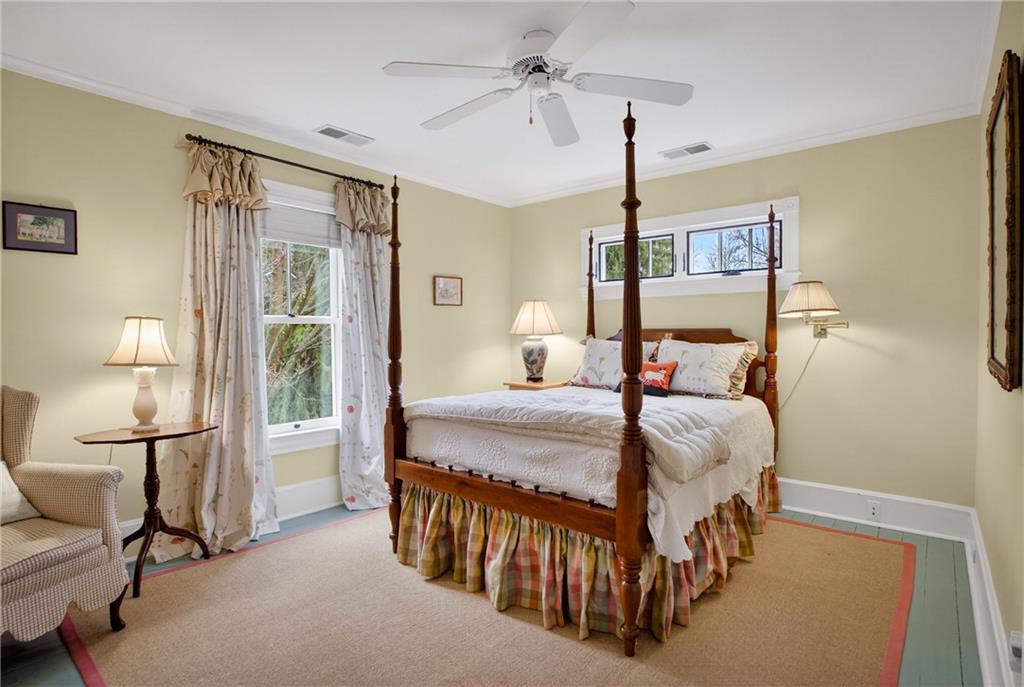 321 Fairview Road Pittsburgh, PA 15238 - Photo 35 of 50 a bedroom with a bed and a chandelier