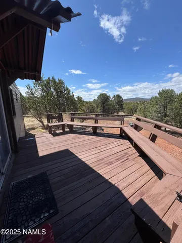 a view of balcony with furniture