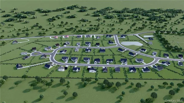 an aerial view of a residential houses with outdoor space