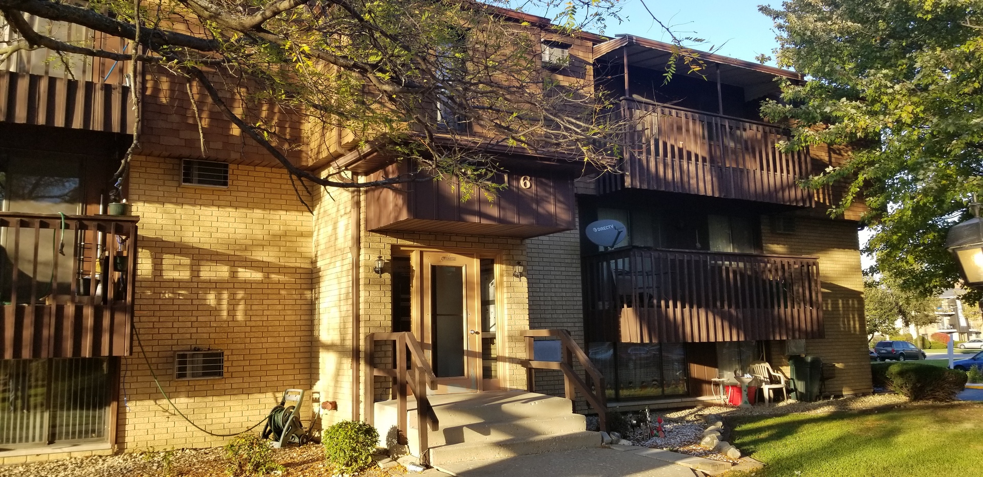 a view of a building with a tree