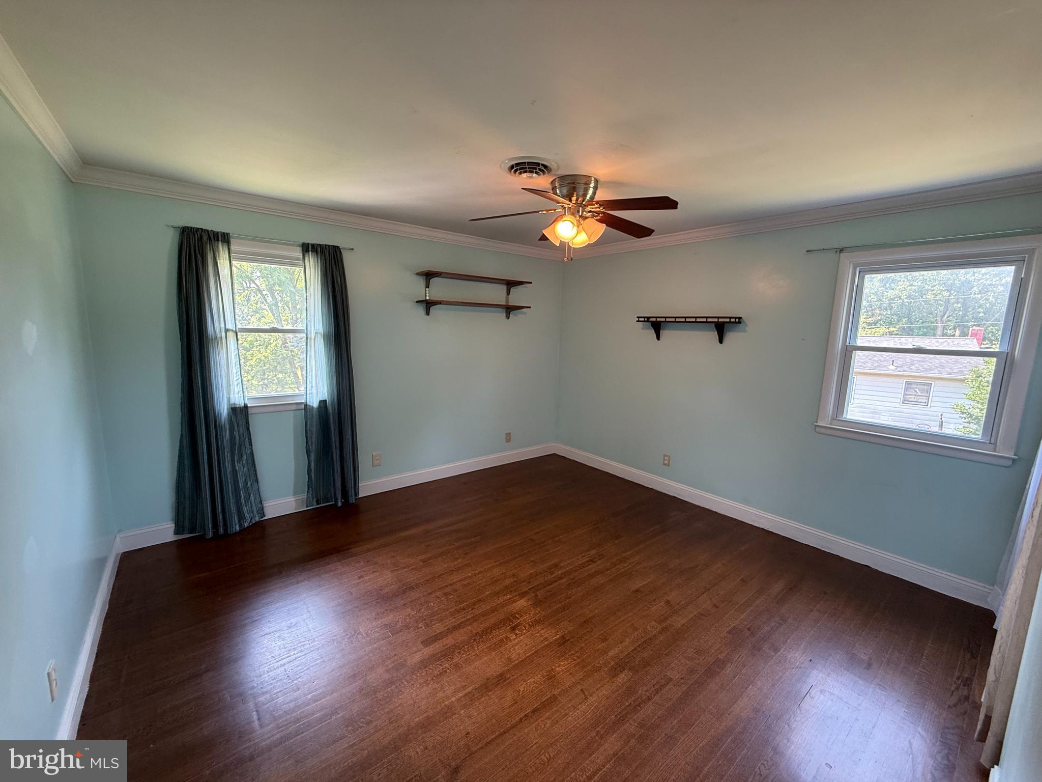 858 Star Court Union Bridge, MD 21791 - Photo 14 of 37 a view of empty room with wooden floor and fan