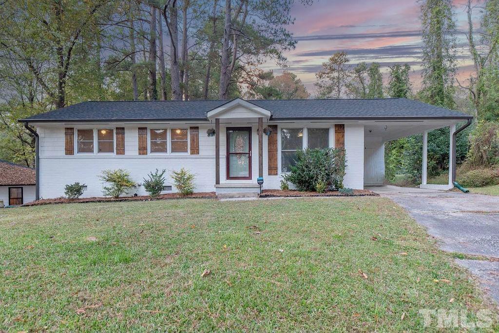 2613 Elmhurst Circle Raleigh, NC 27610 - Photo 1 of 29 front view of a house with a yard