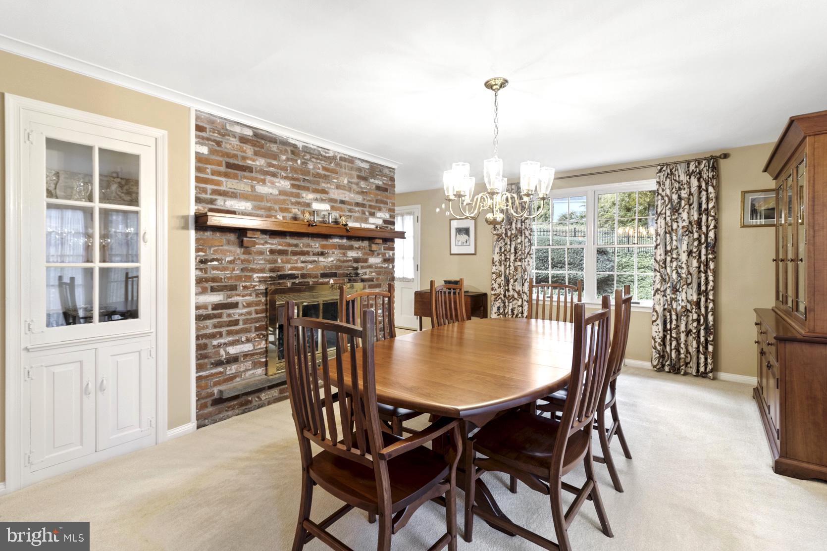 237 Gulph Creek Road Wayne, PA 19087 - Photo 8 of 25 a view of a dining room with furniture window and outside view