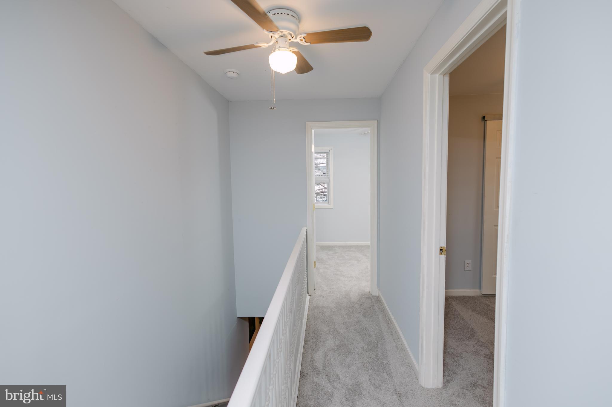 3732 Falls Road Baltimore, MD 21211 - Photo 26 of 46 a view of a hallway with wooden floor