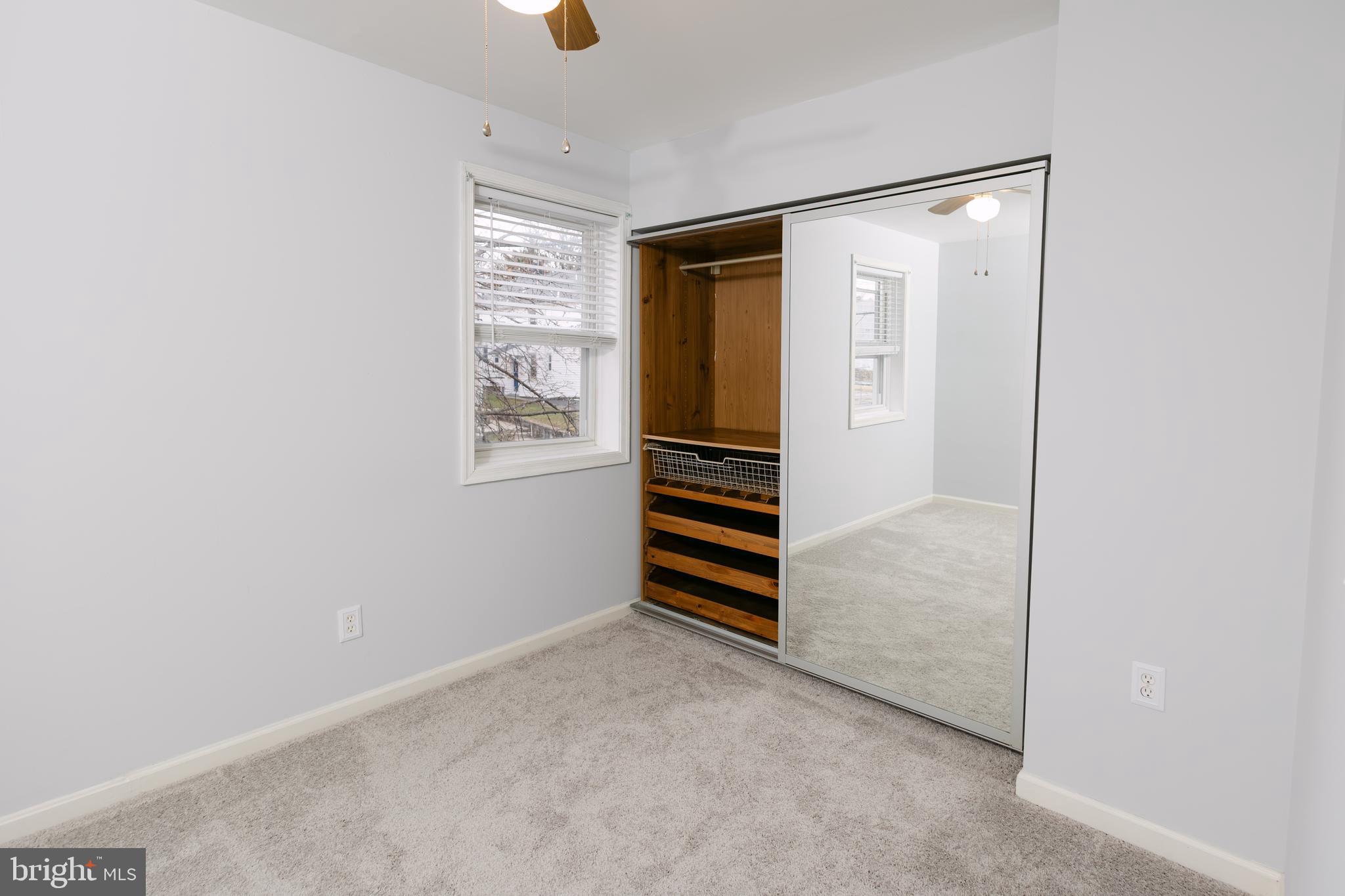 3732 Falls Road Baltimore, MD 21211 - Photo 29 of 46 a view of room with stairs and a window