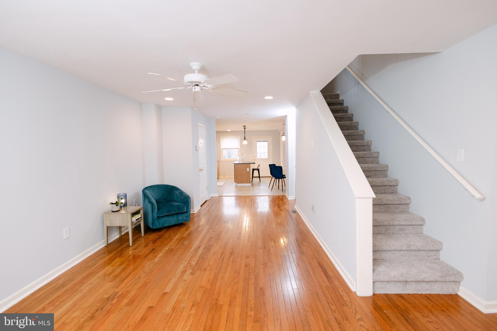 3732 Falls Road Baltimore, MD 21211 - Photo 4 of 46 a view of a hallway with wooden floor and staircase