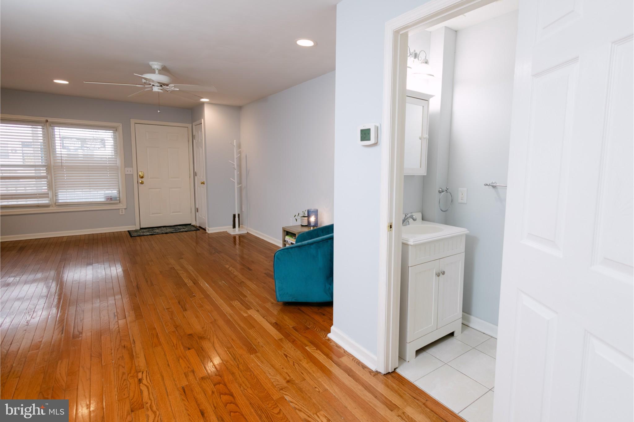 3732 Falls Road Baltimore, MD 21211 - Photo 7 of 46 a bathroom with a sink and a mirror