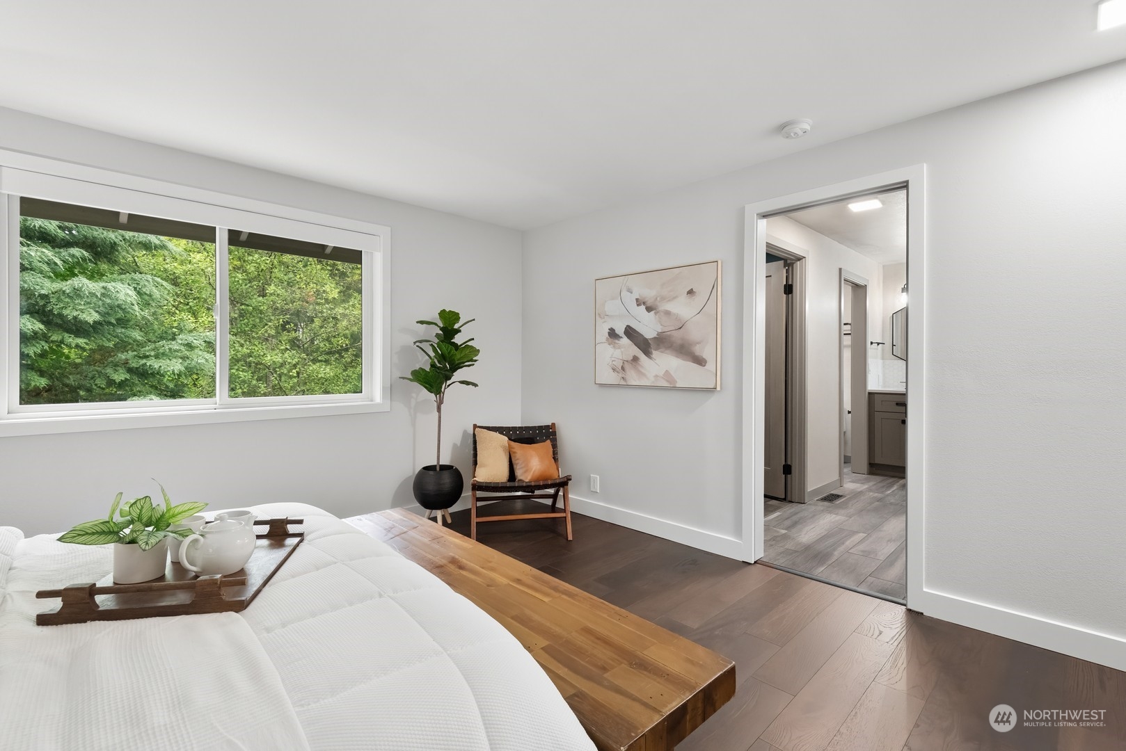 24327 Lockwood Road Bothell, WA 98021 - Photo 18 of 40 a bedroom with a bed and a couch