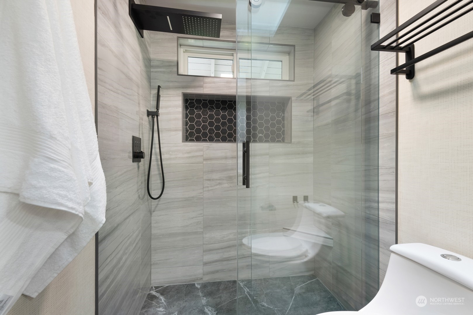 24327 Lockwood Road Bothell, WA 98021 - Photo 22 of 40 a bathroom with a shower and toilet