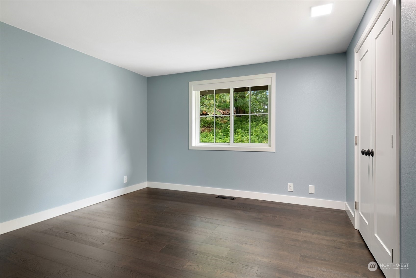 24327 Lockwood Road Bothell, WA 98021 - Photo 24 of 40 wooden floor in an empty room with a window