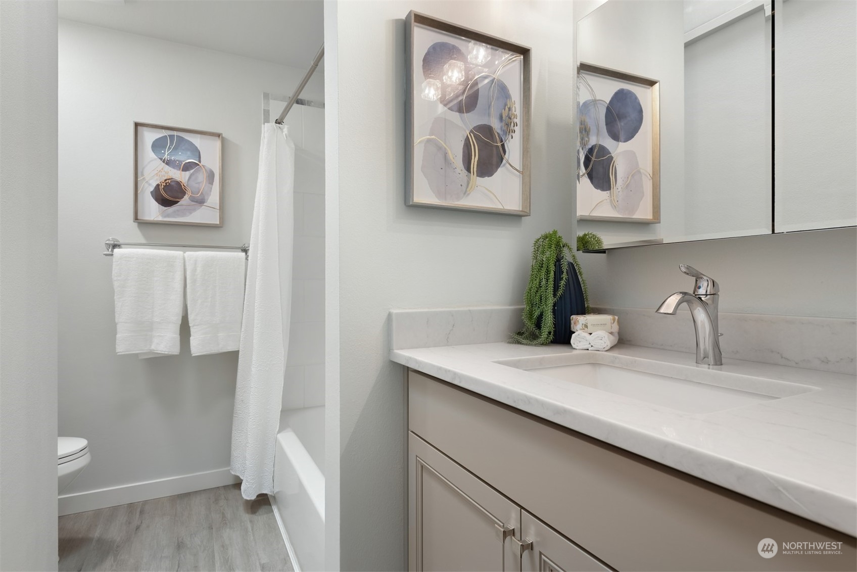 24327 Lockwood Road Bothell, WA 98021 - Photo 27 of 40 a bathroom with a sink and a mirror