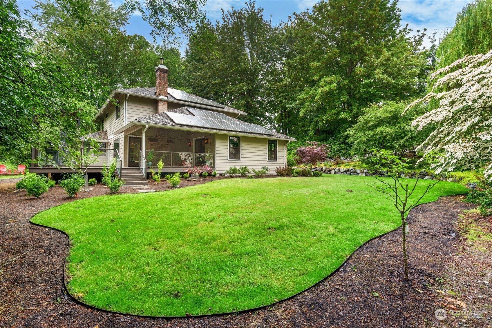 24327 Lockwood Road Bothell, WA 98021 - Photo 32 of 40 a view of a house with a backyard