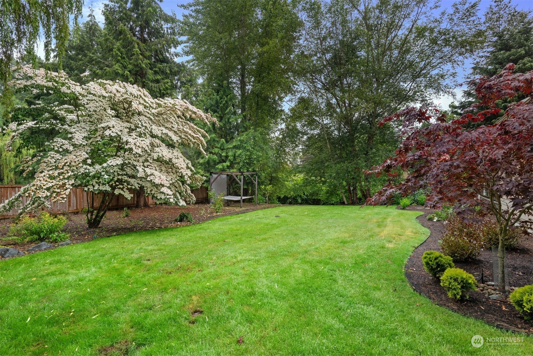 24327 Lockwood Road Bothell, WA 98021 - Photo 33 of 40 a view of a trees with a yard