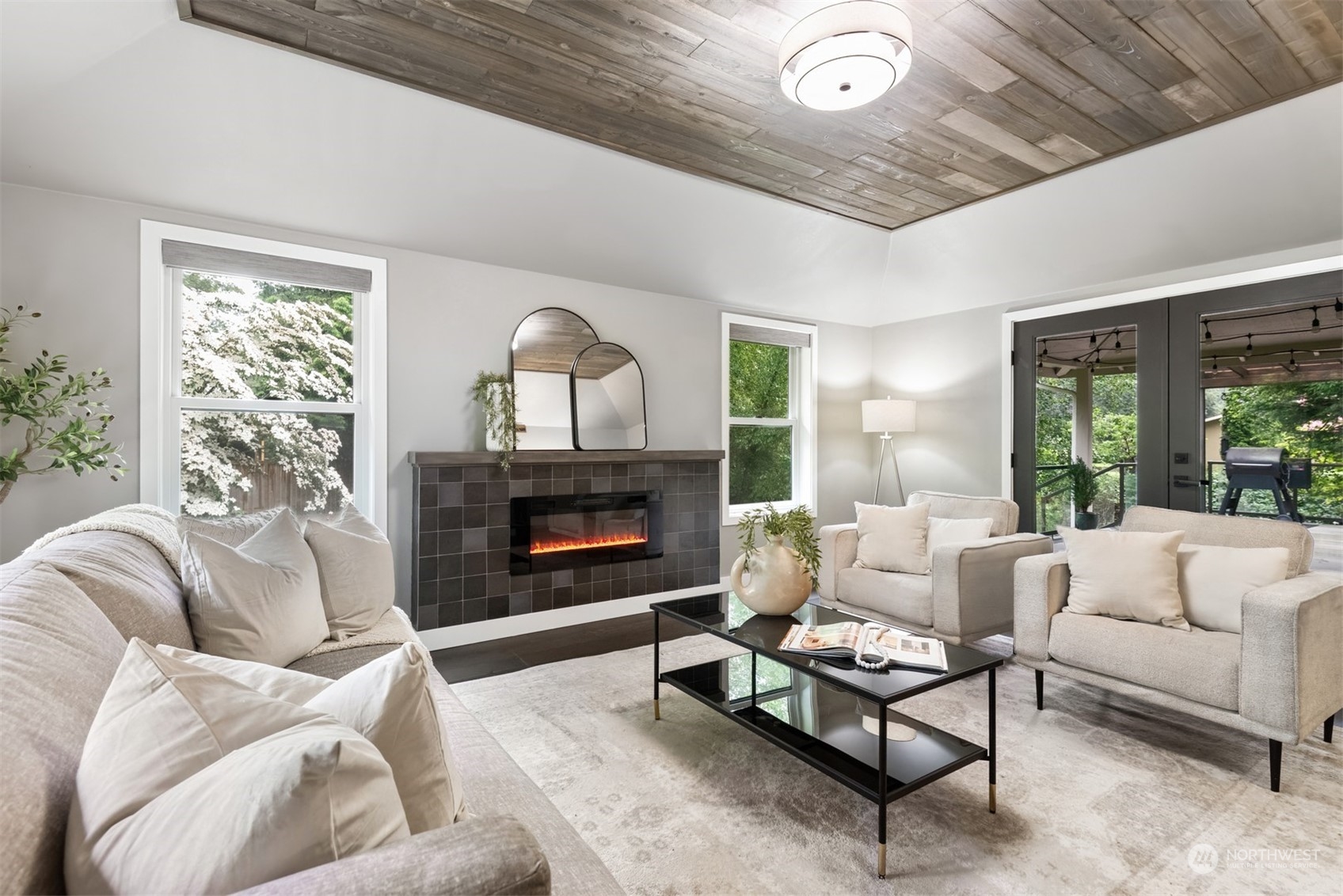 24327 Lockwood Road Bothell, WA 98021 - Photo 4 of 40 a living room with furniture and a fireplace