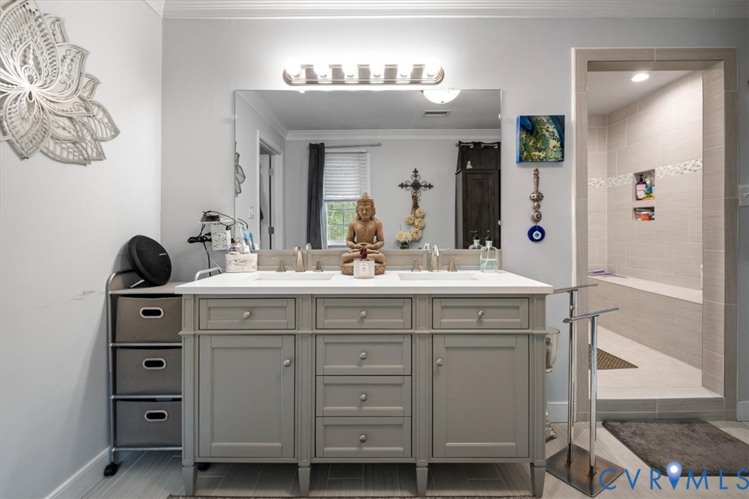 9820 Beaver Bridge Road Chesterfield, VA 23838 - Photo 39 of 54 Dual vanity with a light gray cabinet base, white