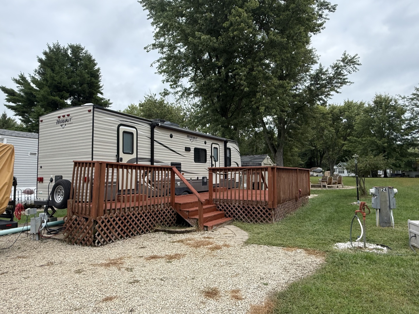 24-82 Woodhaven Lakes Sublette, IL 61367 - Photo 1 of 16 a view of a deck with a fence