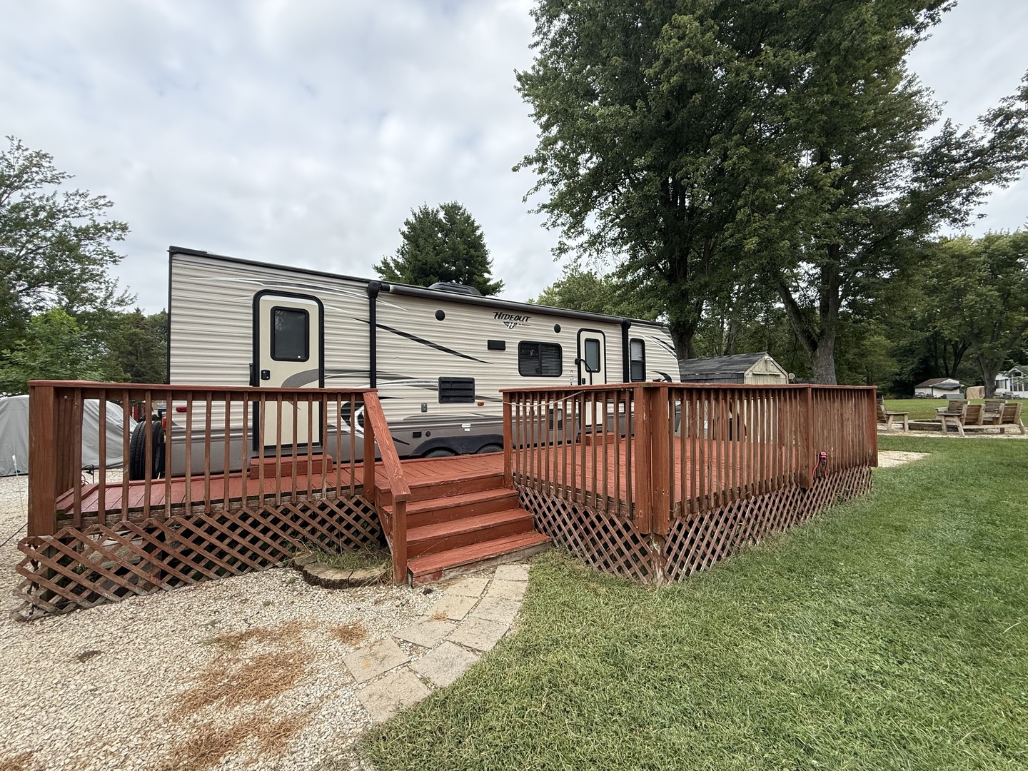 24-82 Woodhaven Lakes Sublette, IL 61367 - Photo 3 of 16 a view of a deck with a fence