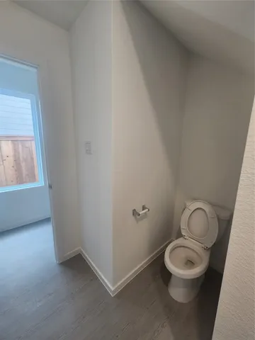 a view of a hallway with staircase