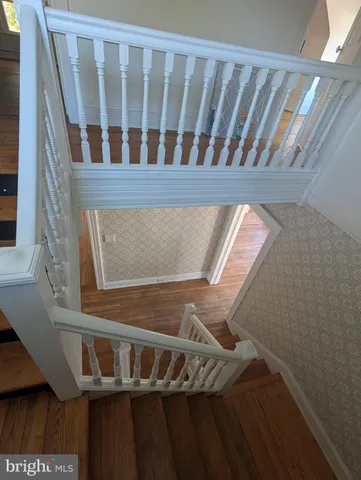 a kitchen with cabinets and window