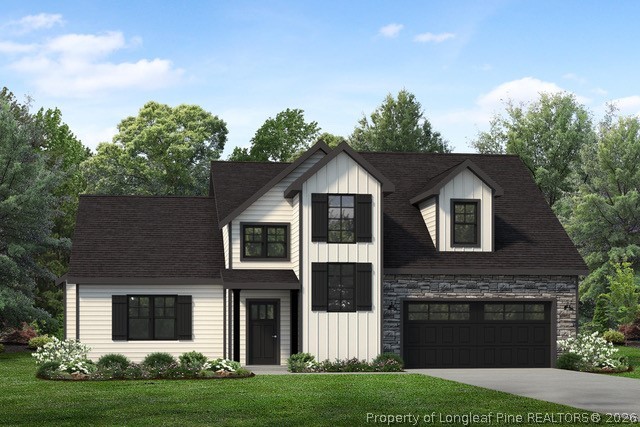 82 Magnolia Grv Way Cameron, NC 28326 - Photo 1 of 20 a front view of a house with a garden and yard