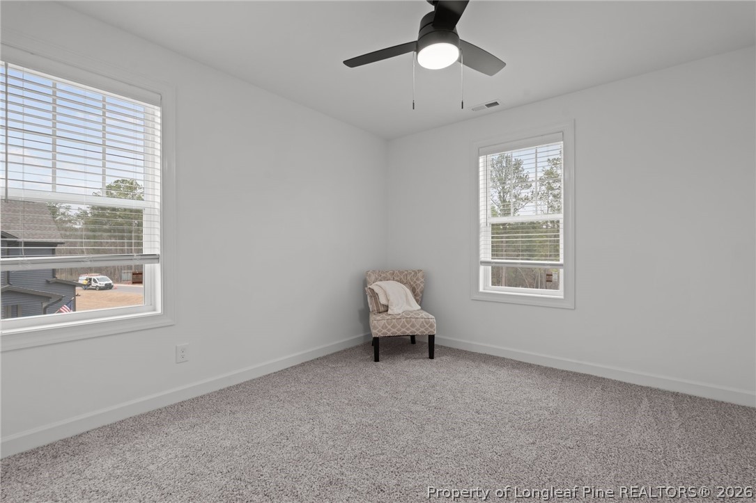 82 Magnolia Grv Way Cameron, NC 28326 - Photo 15 of 20 a living room with furniture and a window