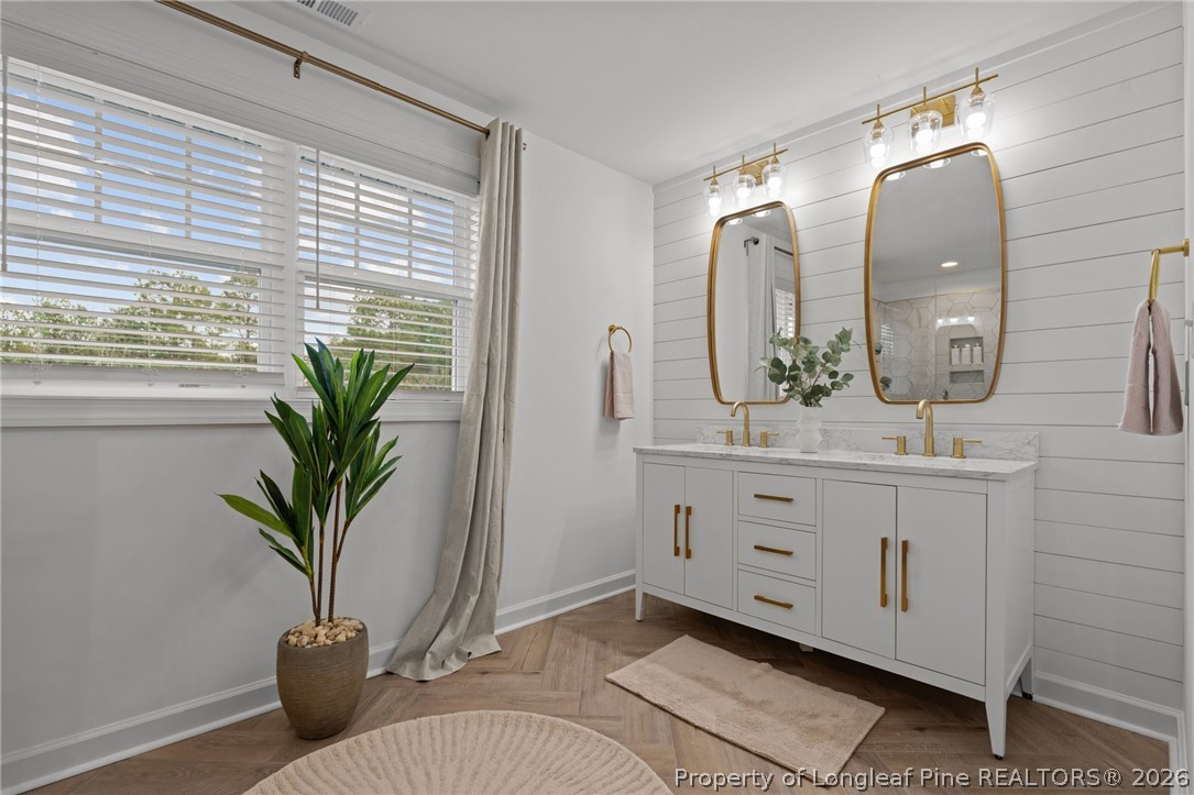 82 Magnolia Grv Way Cameron, NC 28326 - Photo 19 of 20 a bathroom with a potted plant and a sink