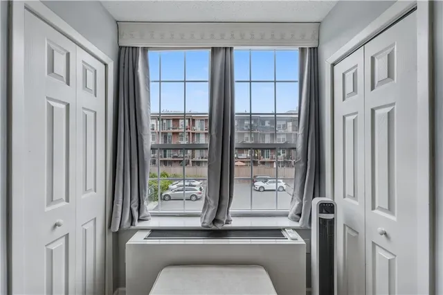 a room with window and shower