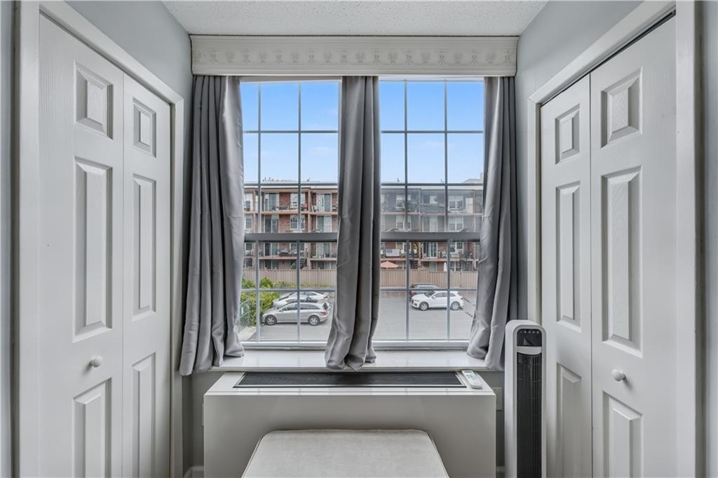 9977 Shore Road, Unit 11D Brooklyn, NY 11209 - Photo 20 of 27 a room with window and shower