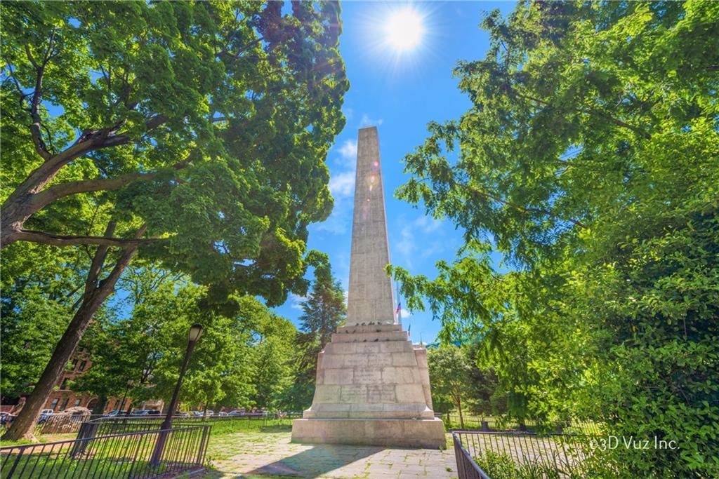 9977 Shore Road, Unit 11D Brooklyn, NY 11209 - Photo 25 of 27 a view of a pathway both side of white house