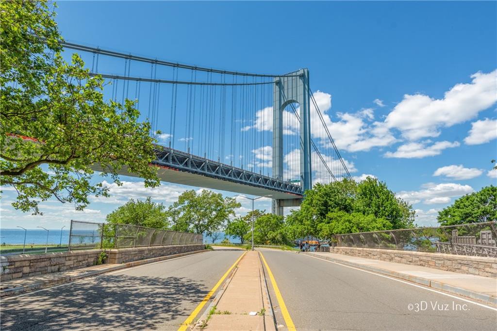 9977 Shore Road, Unit 11D Brooklyn, NY 11209 - Photo 26 of 27 a view of a entrance gate of the house and front view of a house