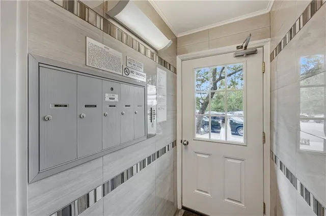 a view of a hallway with windows