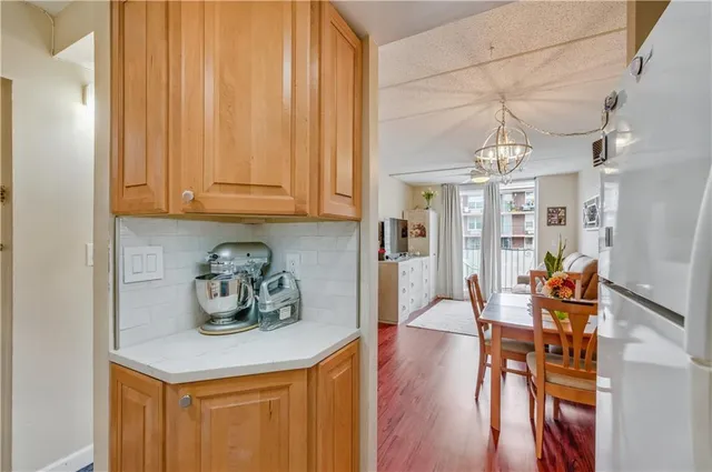 a view of dining room and wooden floor