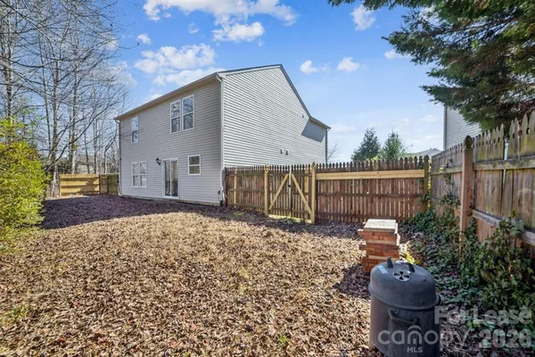 a house view with a garden space