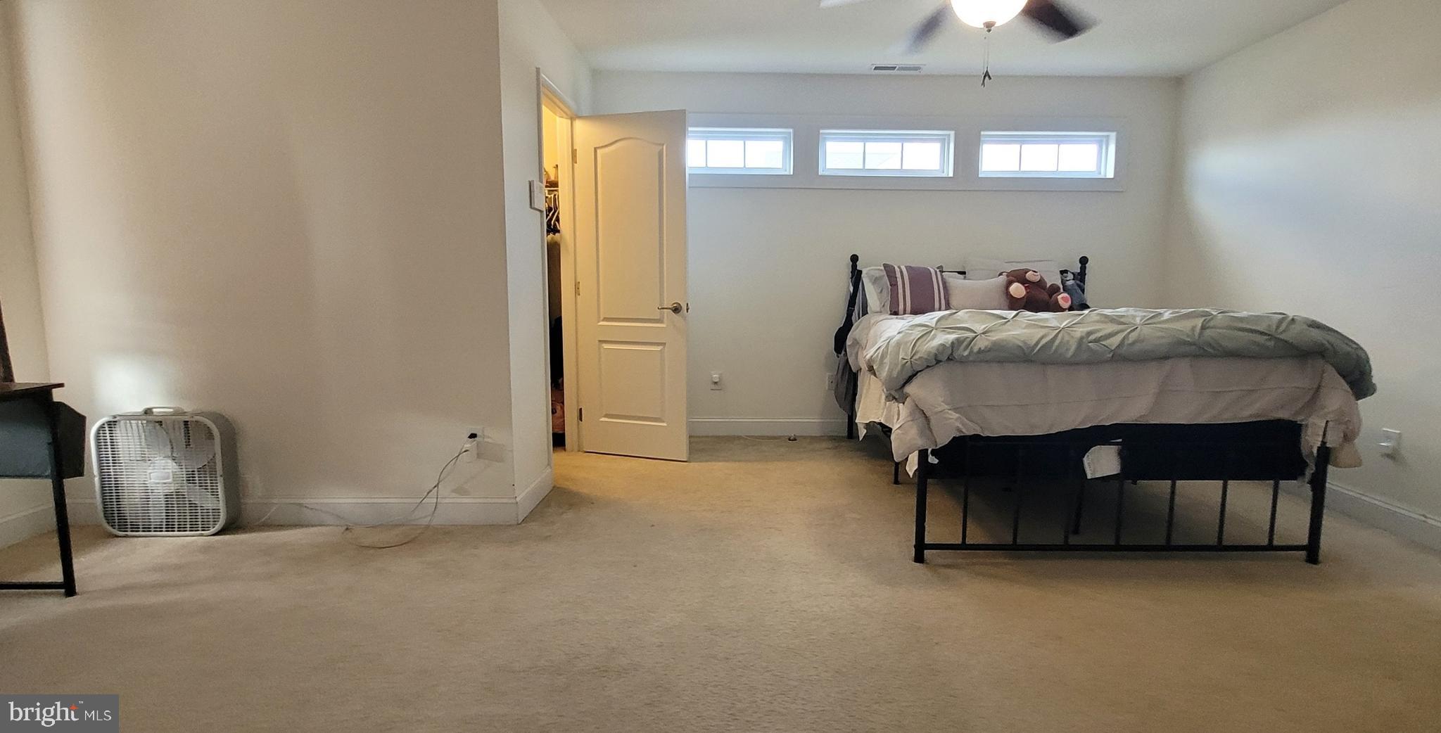 74 Redstone Court Felton, DE 19943 - Photo 18 of 33 a bedroom with a bed and window