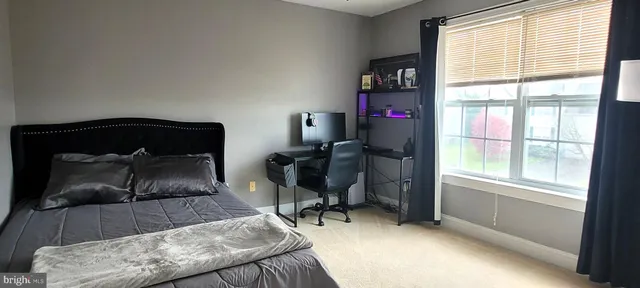 a room with furniture and a window