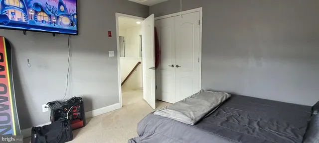 a view of livingroom with hardwood floor and hallway