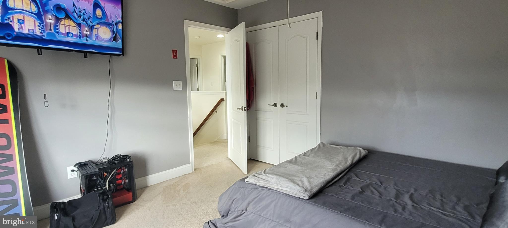 74 Redstone Court Felton, DE 19943 - Photo 23 of 33 a view of livingroom with hardwood floor and hallway