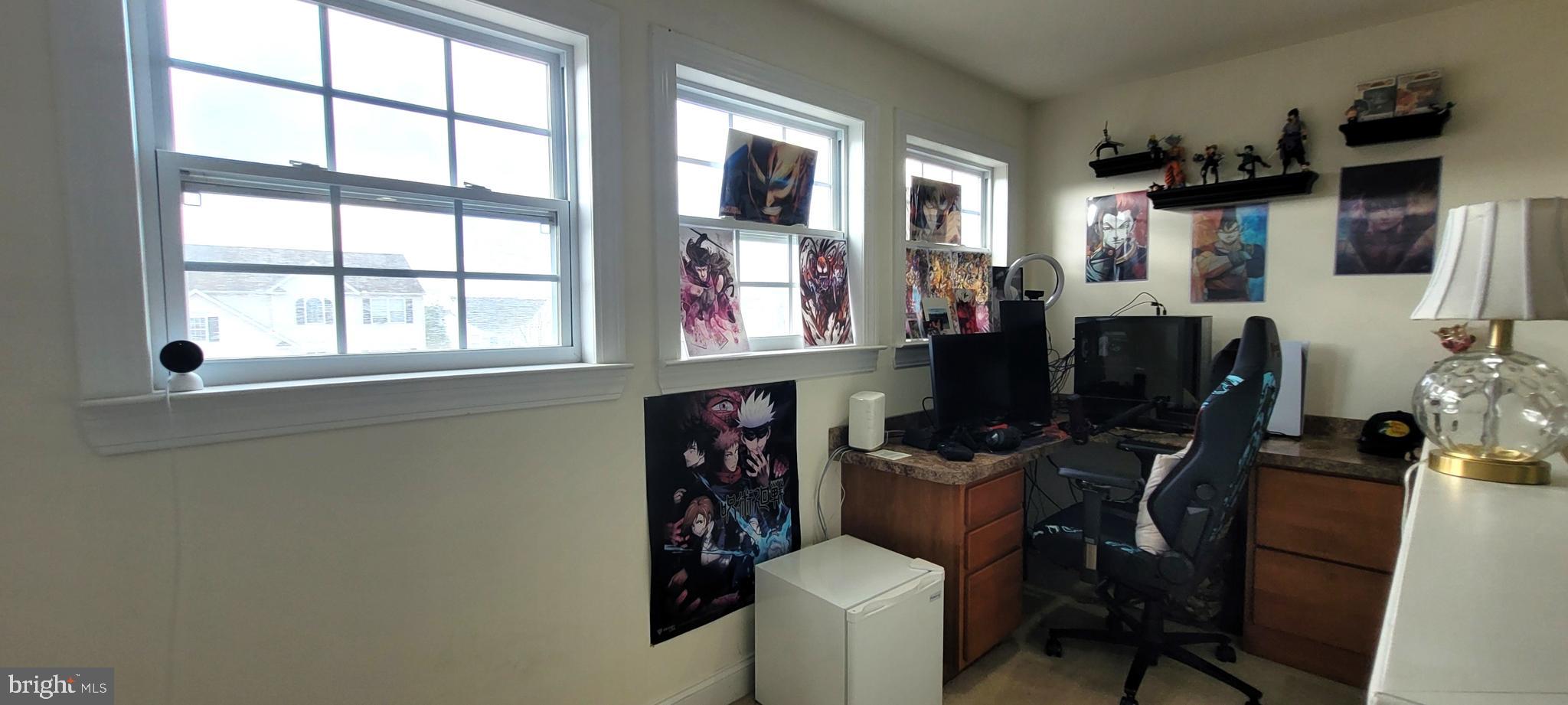 74 Redstone Court Felton, DE 19943 - Photo 27 of 33 a view of workspace with wooden floor windows