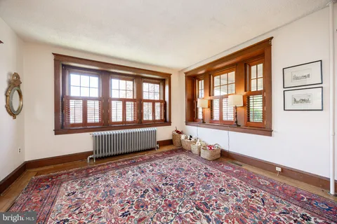 a view of a room with large windows