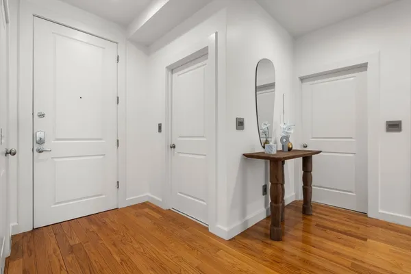 a view of a storage & utility room with a washer dryer