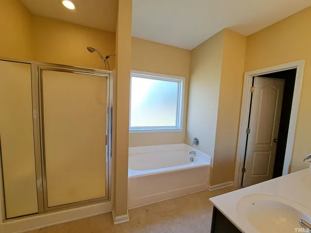 a bathroom with a bathtub