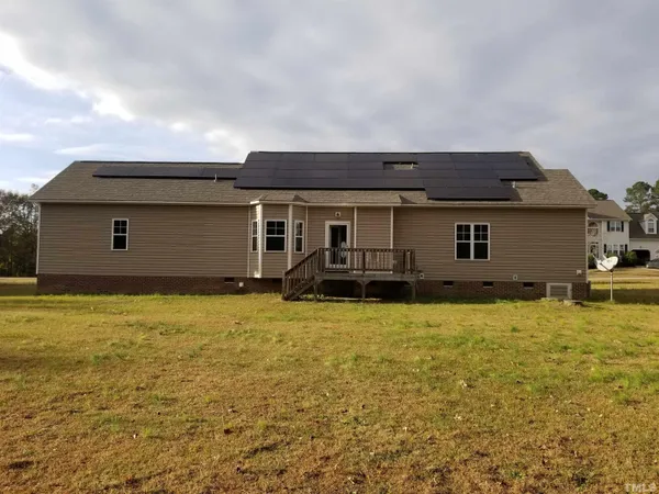 front view of house that has a yard