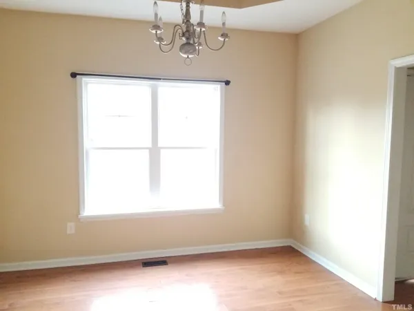 an empty room with a window