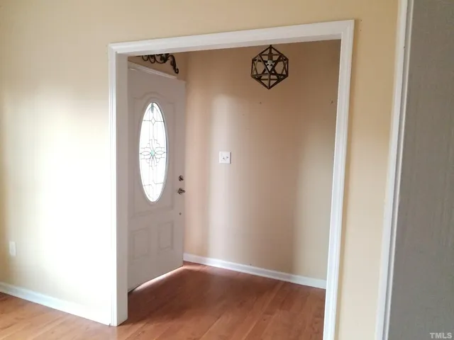 a view of a livingroom with wooden floor