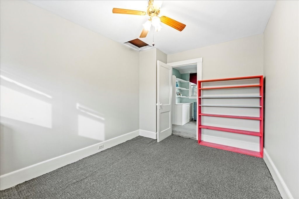 11 Mary Street Springfield, MA 01118 - Photo 32 of 42 a view of storage and utility room with a ceiling fan