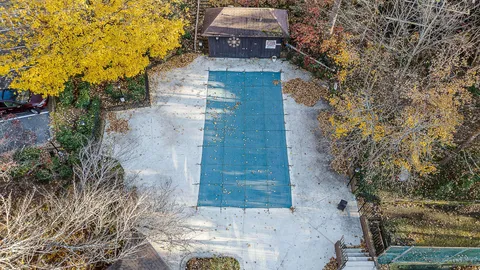 a view of a pathway with a yard