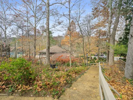 an aerial view of a house with a garden