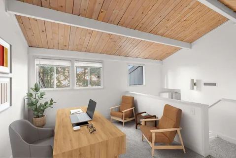 a living room with furniture a window and a potted plant