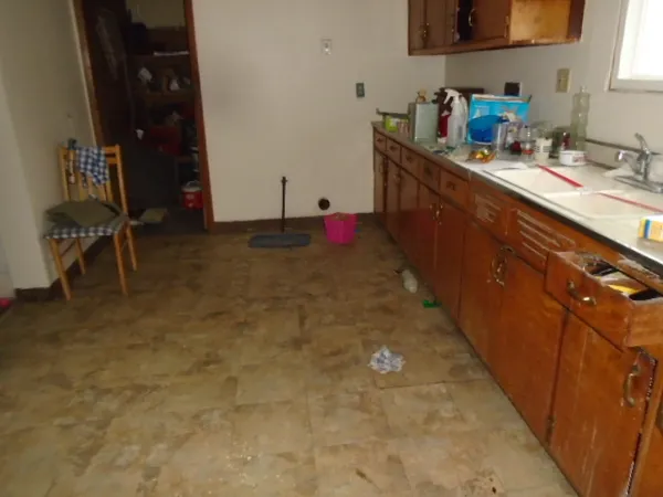a bathroom with a toilet and a tub