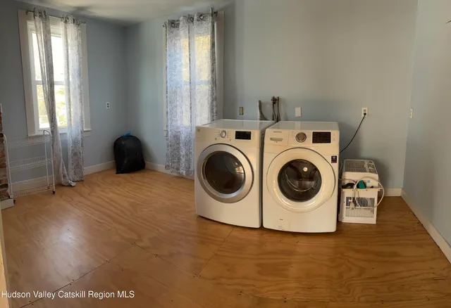 a utility room with dryer and washer
